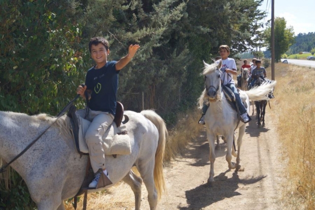 Saludando desde el caballo.jpg